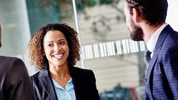 A woman and a man in a business suit.