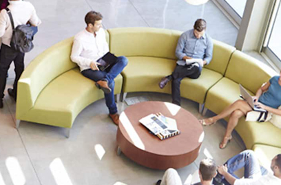 High-angle view of people sitting in office lobby