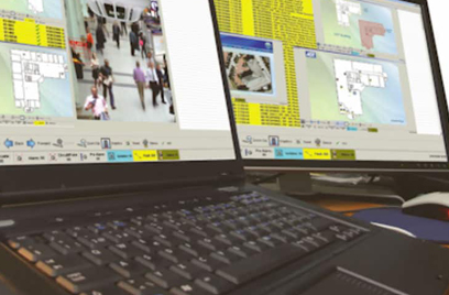Two computer screens displaying fire detection networks