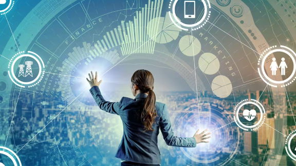 woman working on a user interface with graphics depicting digital communication