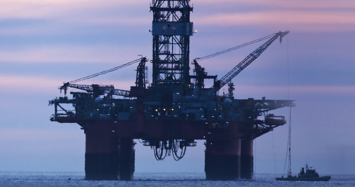 An oil rig during dusk