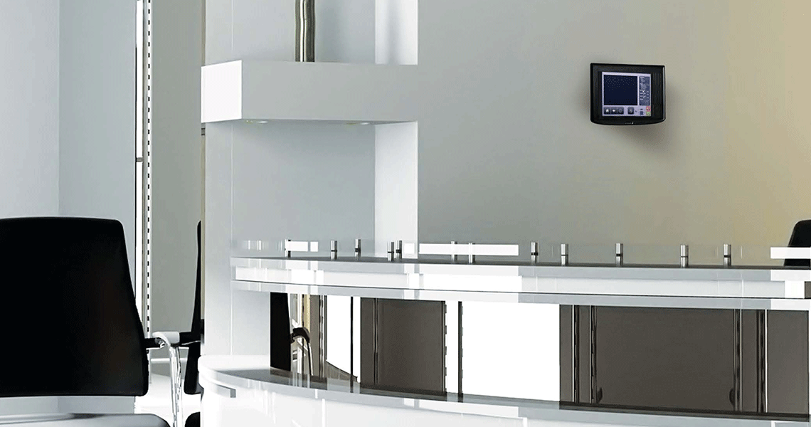 A Zettler Profile Flexible addressable fire control panel on an office wall