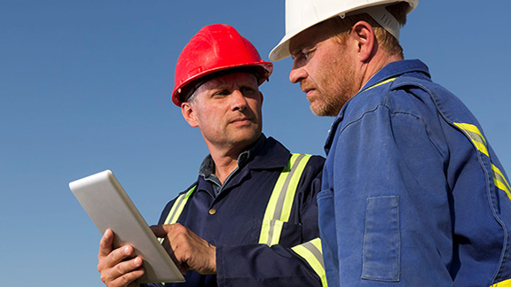Supervisors and safety observers discussing