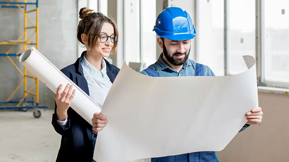 Two Workers Discussing Service plan.