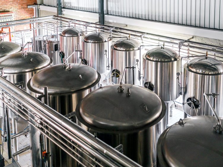 fermentation tanks in a brewery