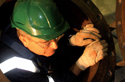 worker climbing out confined space