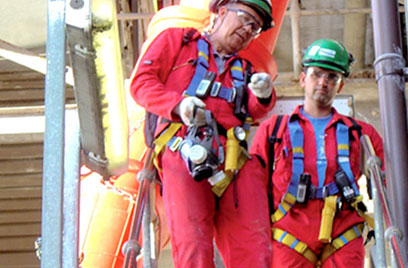 worker protective gear pointing