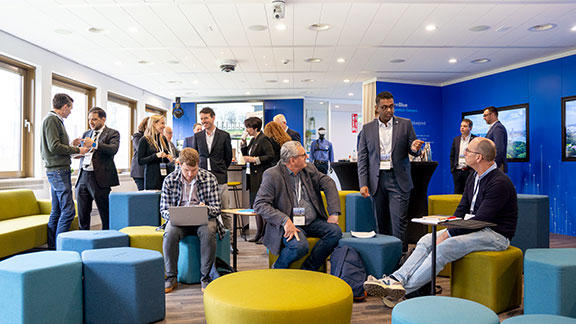 People gathered in a meeting in an office