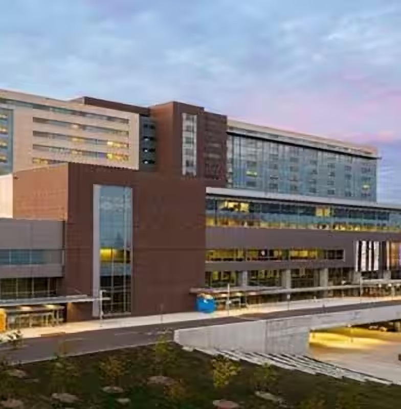 Exterior of a light brown hospital building